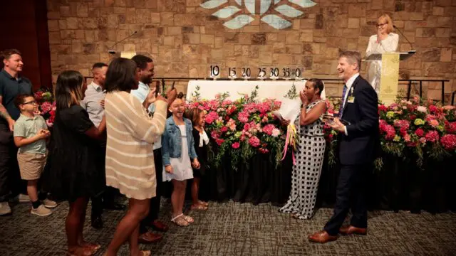 After being named Northeast Georgia Health System’s (NGHS) Carol H. Burrell Employee of the Year. Robyn Bloodsaw was surprised by family that had traveled to the system's Annual Service Awards celebration to congratulate her on the honor. (NGHS photo)
