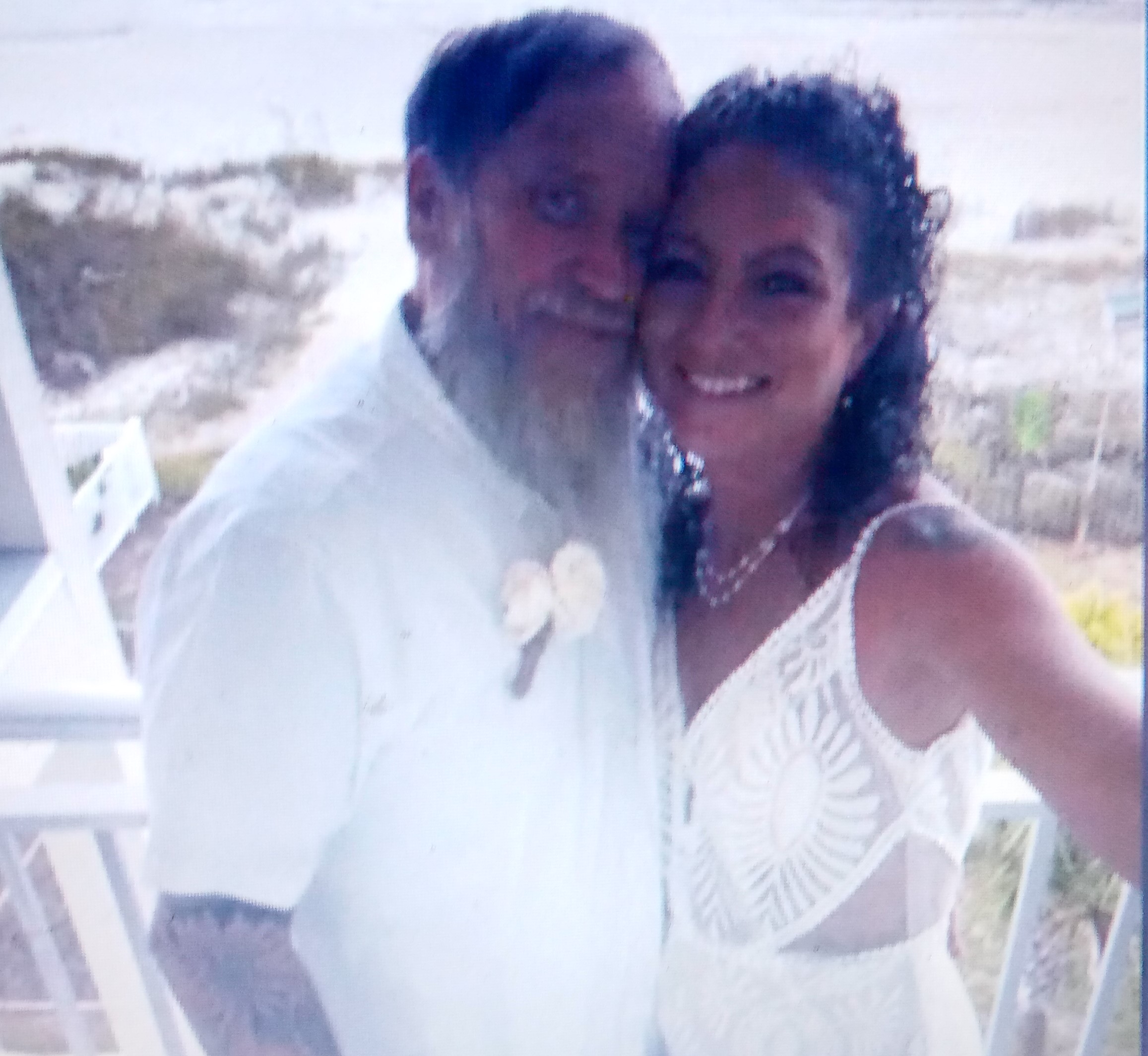 Cumming couple ties the knot on Fla. beach as Helene approached