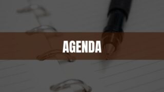 Text that says Agenda on a brown rectangle with a notebook in the background