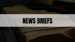 Text that says News Briefs on a white rectangle with file folders in the background
