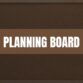Text that says Planning Board with a bulletin board in the background
