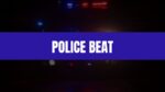 Text that says Police Beat on a blue rectangle with a police car with lights on in the background