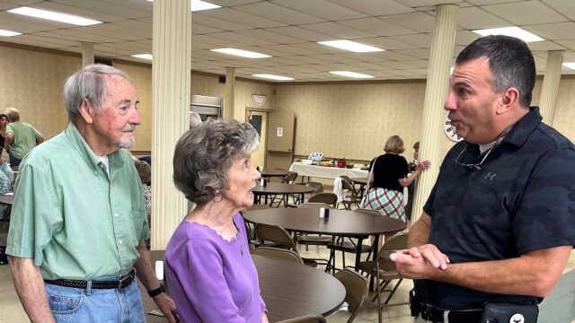 Jim and Margie Delay with Sgt. Grindle. (HCSO photo)