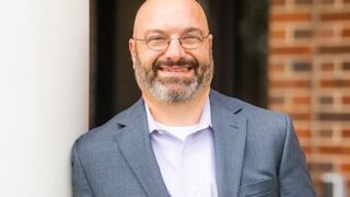 Dr. Caner, above, had been TMU President for 17 years. (TMU photo)