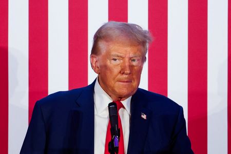 FILE PHOTO: Republican presidential nominee and former U.S. President Donald Trump looks on as he addresses the Fraternal Order of Police at their meeting in Charlotte, North Carolina, U.S. September 6, 2024. REUTERS/Jonathan Drake/File photo