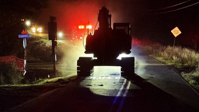 Escorted by emergency vehicles, an excavator is returned to its jobsite on Old Athens Highway
Friday night after being recovered during an arrest. (Demorest Police Department photo)