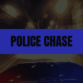 Blue rectangle with black text that says Police Chase and a fast-moving police car in the background.