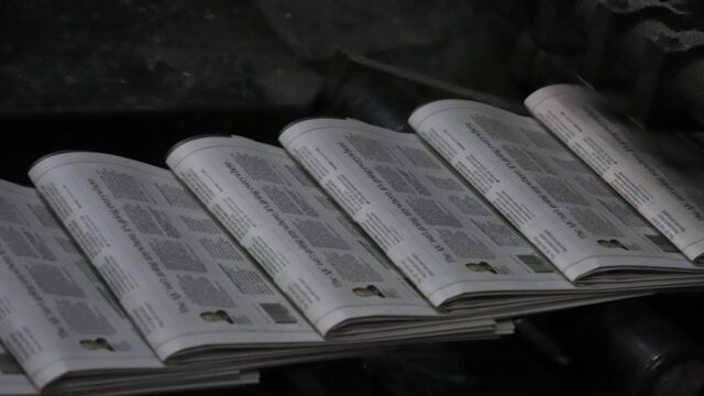 Final copies of the AJC roll off the presses at The Times in Gainesville. (Times photo)