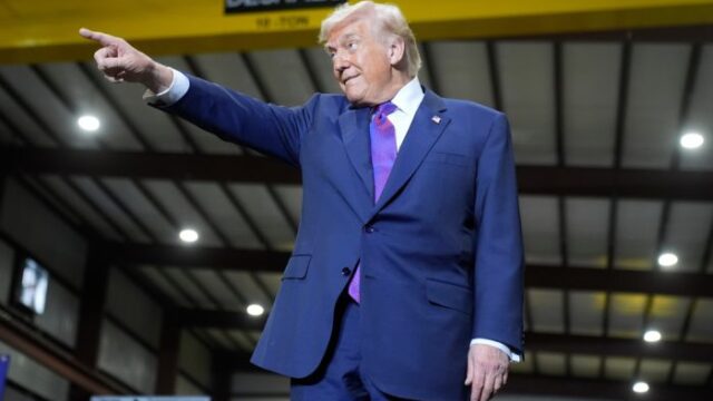 Trump acknowledges the crowd as he prepares to speak in Rome Thursday. (SRN NEWS/AP photo)