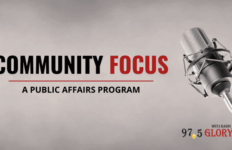 Text that says Community Focus A Public Affairs Program with microphone and station's logo.