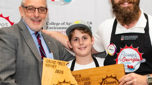 Papa Mountain won the grand prize at the 2026 Flavor of Georgia food product competition for its Garlic and Herb Bread Rolls. Pictured from left are CAES Dean and Director Nick T. Place, Everett Cohen and Solomon Cohen. (Photo by Justin Evans via uga.com)

  