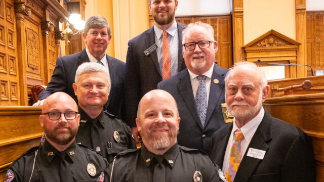 Police Officer Terry Palmer Jr. (front), Assistant Chief Ryan
Ledford, Chief Danny Cloutre, Senator Larry Walker III, Senator Bo Hatchett, President
of North Georgia Mountains Lodge 112 Fraternal Order of Police Michael Palmer, Mayor
Franklin Brown (City of Clarkesville photo)
