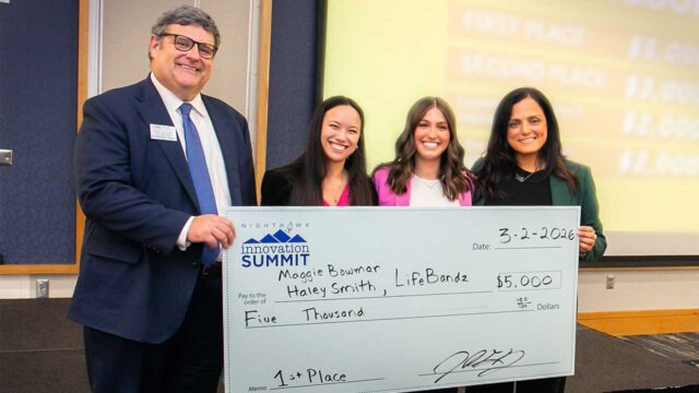 Maggie Bowmar, Gainesville, second from left, and Haley Smith Cumming, earned first place at the innovateUNG Pitch Challenge held recently. Dr. Mike Lavender, Mike Cottrell College of Business associate dean of undergraduate programs, and associate professor Dr. Mariangela Vecchiarini-Piazza, far right, presented the ceremonial prize check. (UNG photo)