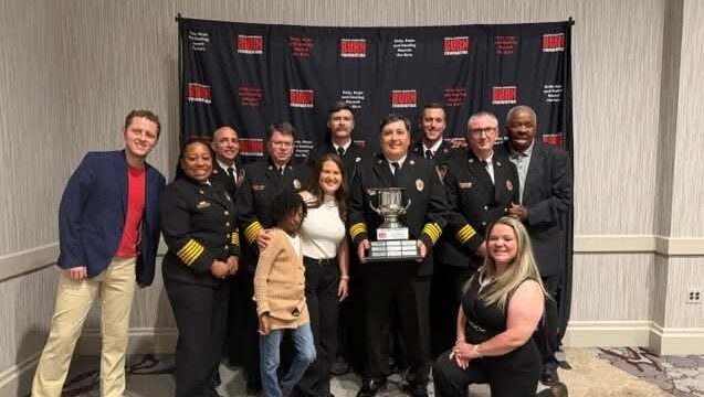 Members of Hall County Fire Rescue are pictured with representatives of the Georgia Firefighters Burn Foundation and a burn survivor who has benefited from the foundation's mission.

(HCFR)