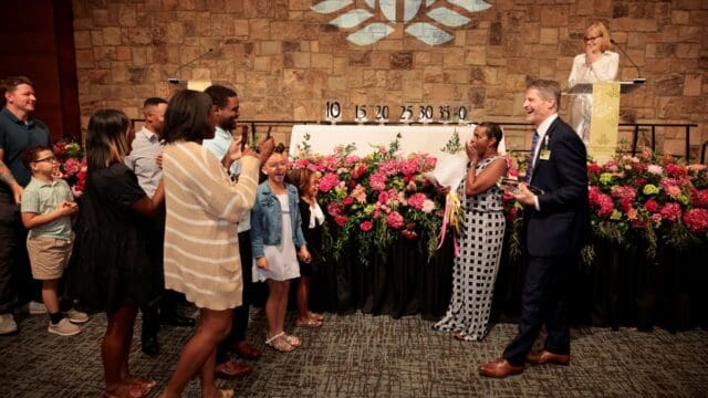 After being named Northeast Georgia Health System’s (NGHS) Carol H. Burrell Employee of the Year. Robyn Bloodsaw was surprised by family that had traveled to the system's Annual Service Awards celebration to congratulate her on the honor. (NGHS photo)