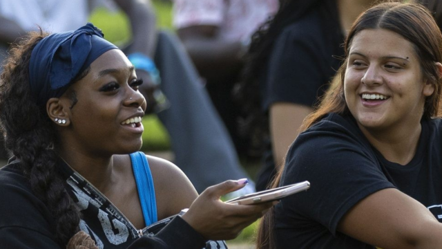 Getting acquainted, renewing friendships.
(Brenau U.)