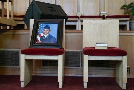 FILE PHOTO: A photo of U.S. Airman Roger Fortson is displayed during a press conference at Mt. Zion Second Baptist Church, in Atlanta June 3. (SRN NEWS/REUTERS/Alyssa Pointer)