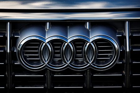 A logo of Audi is seen outside a car dealer in Nijmegen, Netherlands February 26, 2025. (SRN NRES/REUTERS/Piroschka van de Wouw)