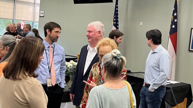 Court Administrator Jason Stephenson (l) chats with his new Judicial Accountability Division Director Kevin Head. (HCSO)